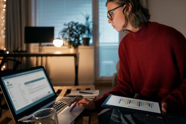 A person diligently working on a budget spreadsheet on their laptop, showcasing financial planning and expense tracking.