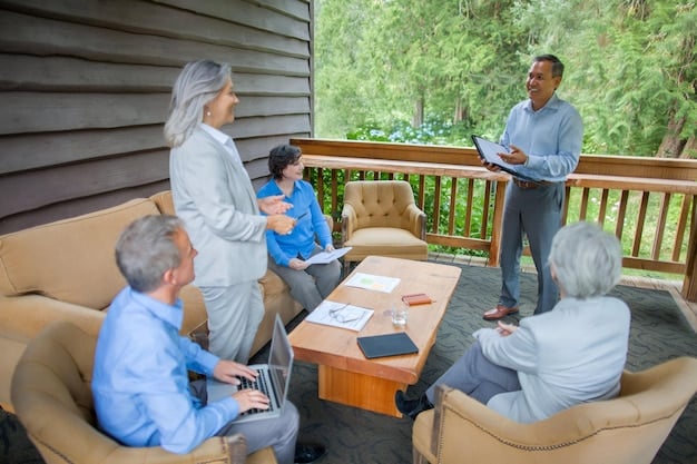 A diverse group of people attending a real estate seminar, listening attentively to a speaker presenting charts and graphs on real estate investment strategies.