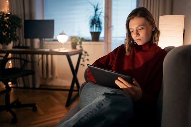 A freelancer reviewing health insurance options on a tablet at home, with a family photo in the background. Aim for a warm, relatable scene.