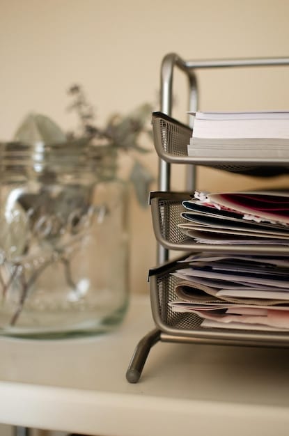 A close-up shot of various tax forms, including W-2, 1099, and 1098, neatly organized in a file folder or on a well-organized desk. The focus is on the clarity and accessibility of the documents.