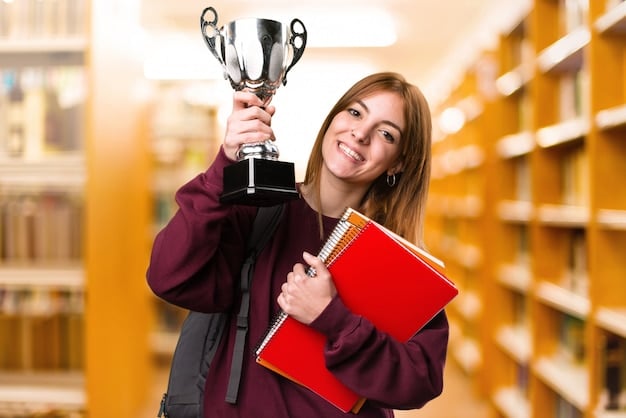 A student proudly displaying an award at an academic competition. The student is smiling, and the background shows other students and judges applauding. The award is clearly visible, showcasing the student's achievement.