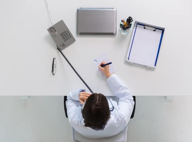 An overhead shot of a person carefully reviewing legal documents related to the Fair Labor Standards Act (FLSA), highlighting the complexity of overtime regulations, with a pen and notepad nearby.