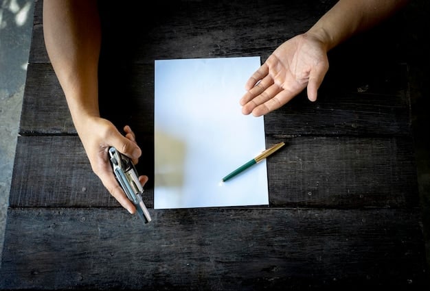 An image showing hands filling out a form with a pen, with a focus on the signature line, symbolizing the act of applying for student loan forgiveness.