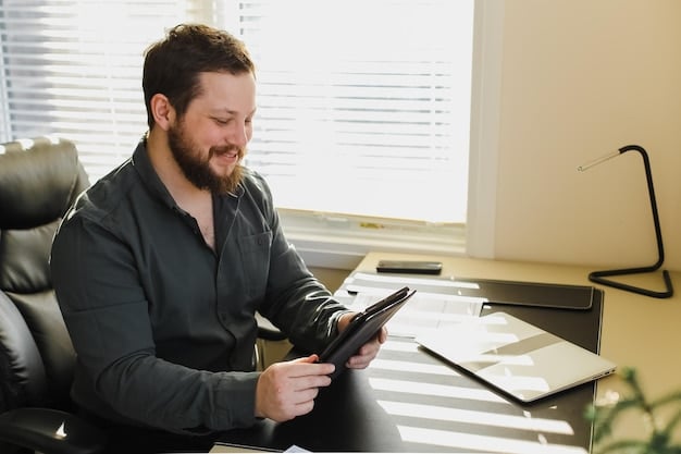 A person meticulously preparing notes and data on a tablet, set against a well-lit background in a corporate office, signifying thorough preparation for a salary negotiation meeting.