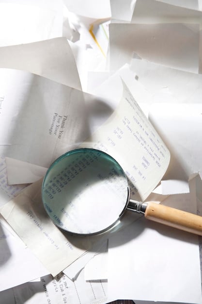 A magnifying glass focusing on IRS tax forms, highlighting the details and regulations associated with charitable deductions.