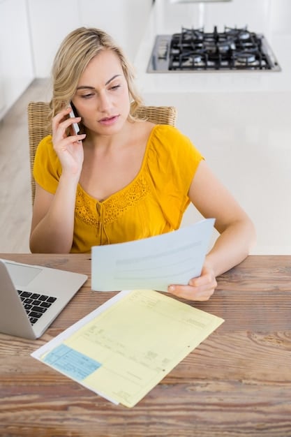 A close-up of a freelancer organizing receipts and invoices, highlighting the importance of meticulous record-keeping for tax purposes.