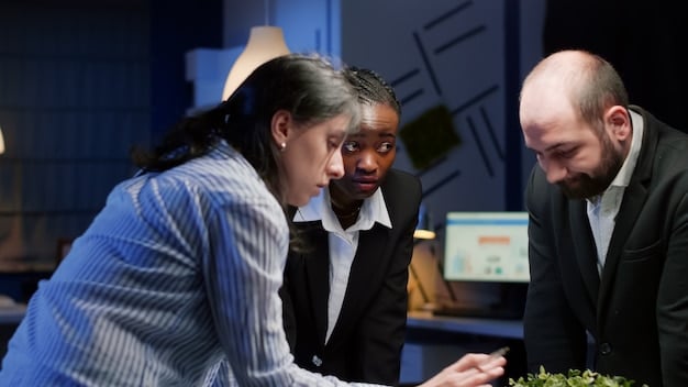 A diverse group of professionals collaborating around a table, examining data visualizations from an AI-driven financial analysis tool, emphasizing teamwork and adaptability.