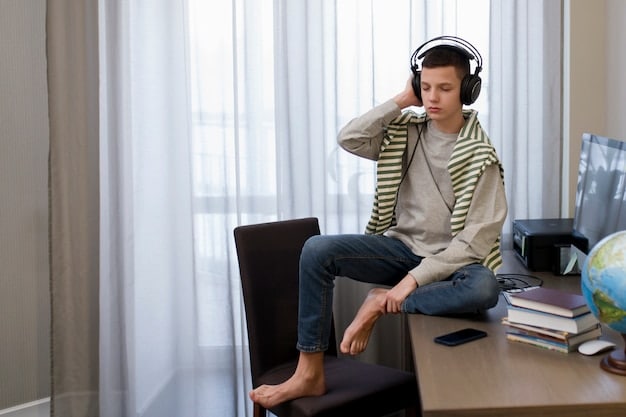A student working at a tidy desk in a quiet library, wearing noise-canceling headphones and using a website blocker on their computer, demonstrating strategies for staying focused and minimizing distractions.