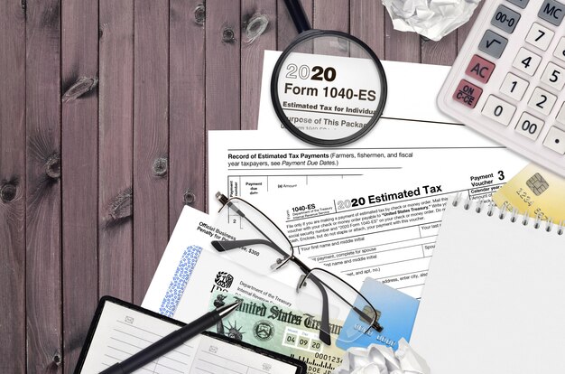 Detailed image of a 1098-E form for student loan interest deduction, highlighting the 'Interest Paid' section with a magnifying glass, emphasizing financial documentation.